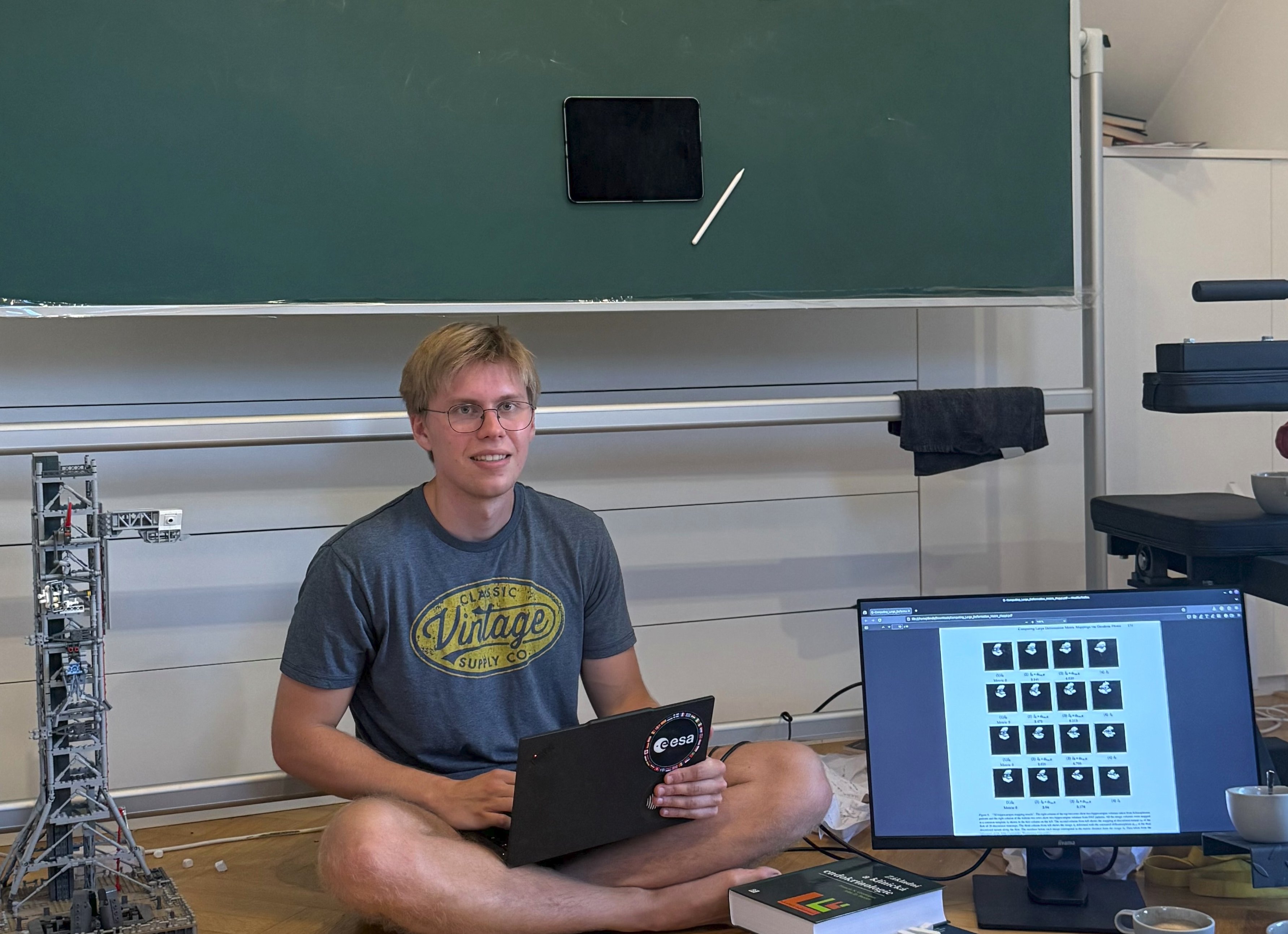 image of Denis in his room